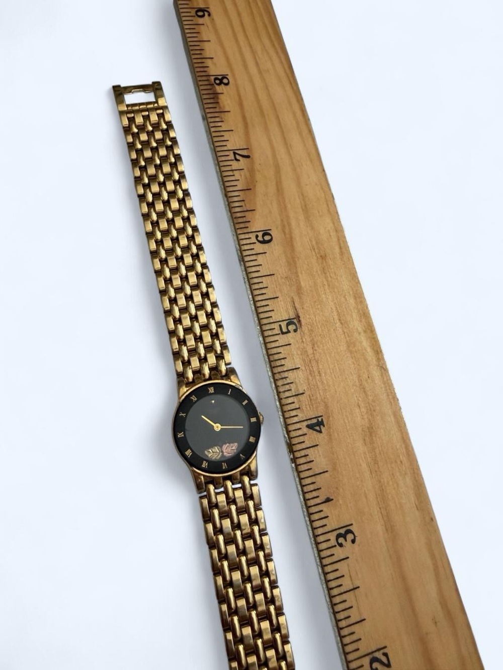 Gold-Tone citizen Watch with Black Dial and gold leaves 🍃